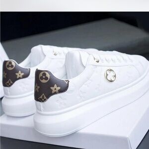 Elegant White Women's Sneakers with Designer Accents